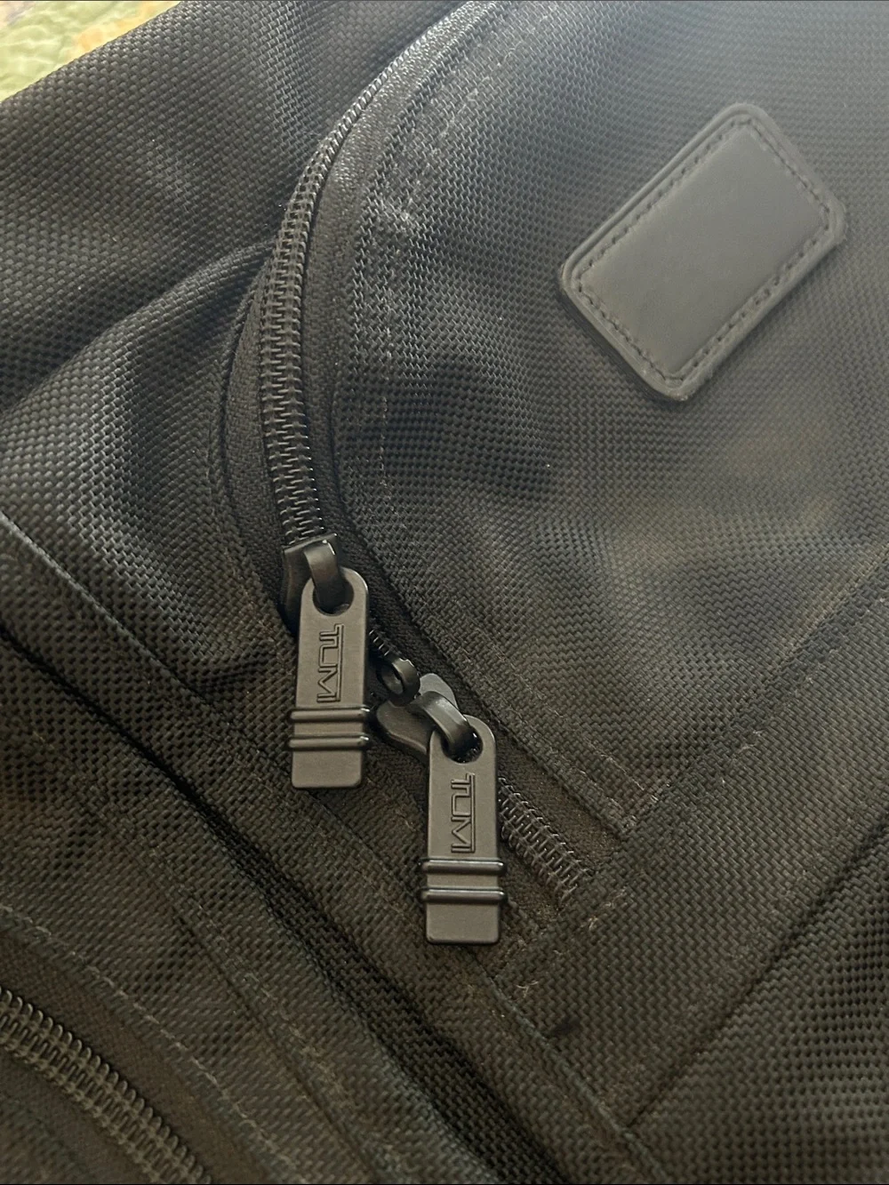 Tumi leather luggage